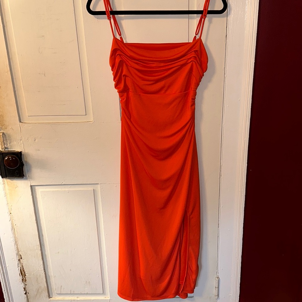 ASTR orange midi dress with open back and slit